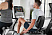 VF22_LIFESTYLE_ES female-male upright recumbent bike-race_side-angle_lores