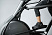 VF23_LIFESTYLE_LC female legs working out_elliptical_profile close_lores